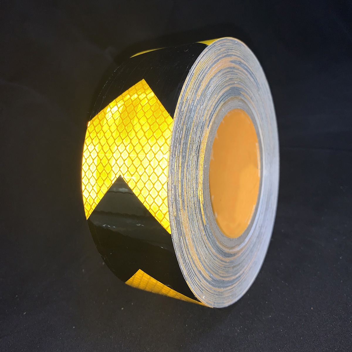 Flecha microprismática PET de 5cm x 25m tipo reflectante lámina negra + dorada