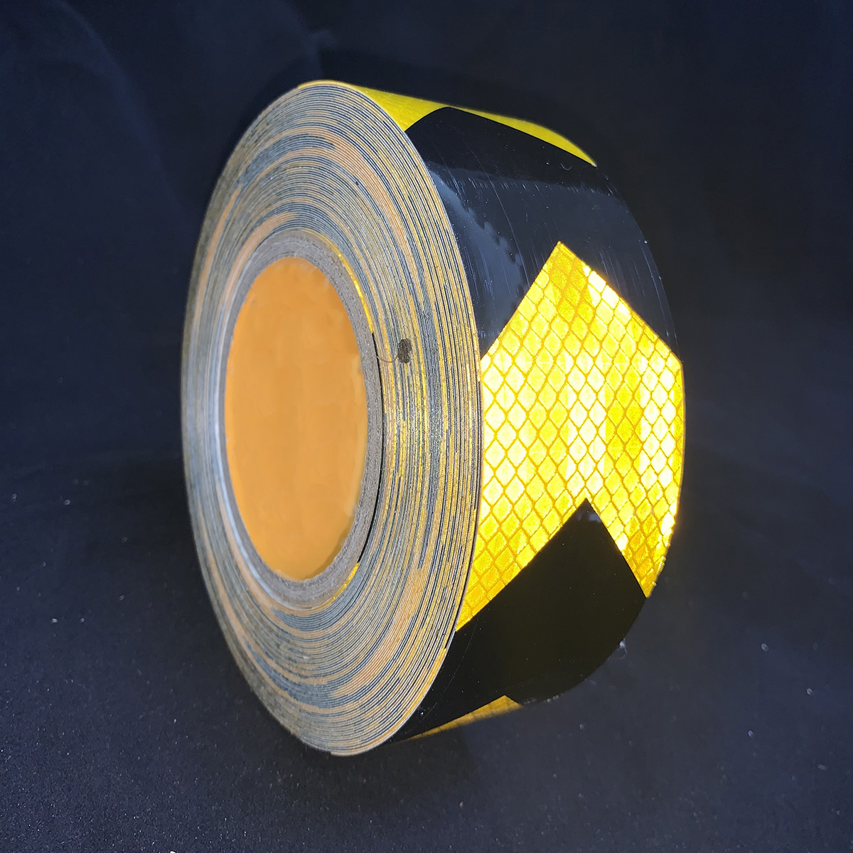 Flecha microprismática PET de 5cm x 25m tipo reflectante lámina negra + dorada